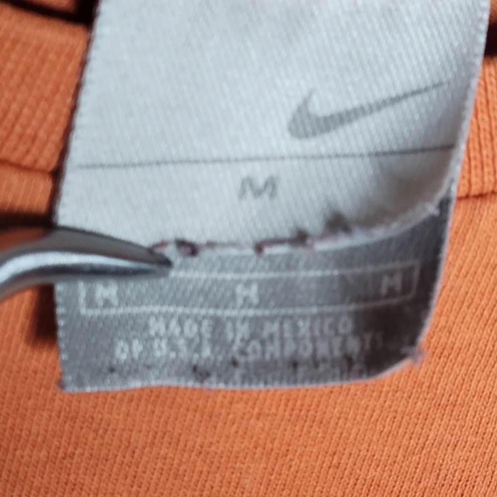 Vintage Y2K Nike Mini Swoosh Silver Tag Embroidered T-Shirt in Orange Size M